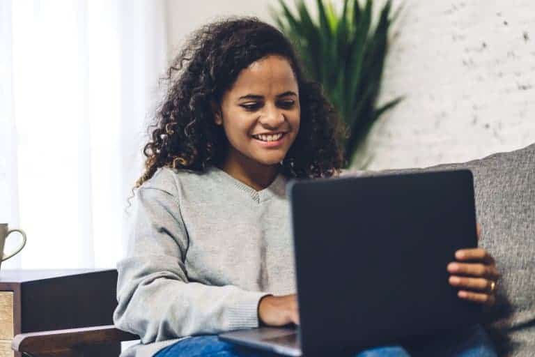 African American Teen girl attending an online counseling session with a teen therapist scaled