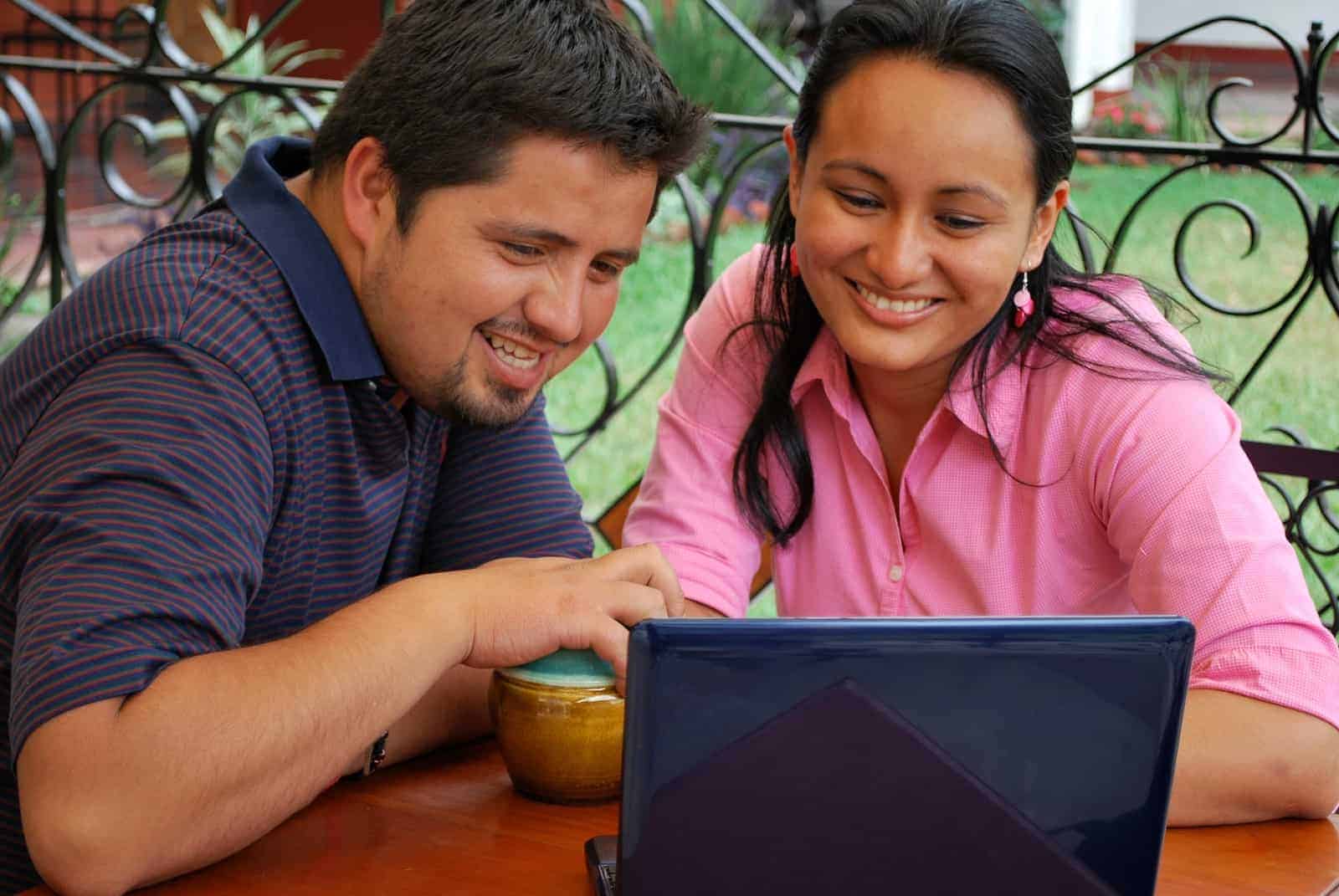 bigstock Young Hispanic Couple Using A 5011417